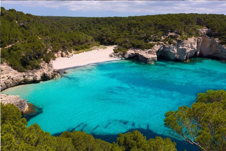 The hidden away Cala Mitjaneta in Menorca